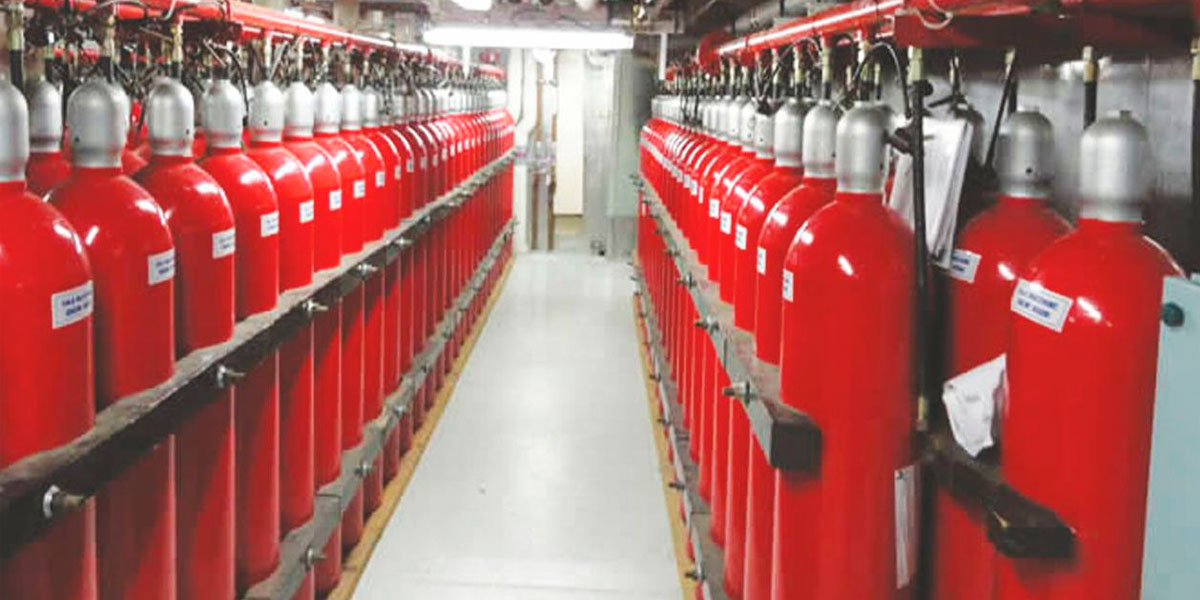 Suppression gas bottles in a room